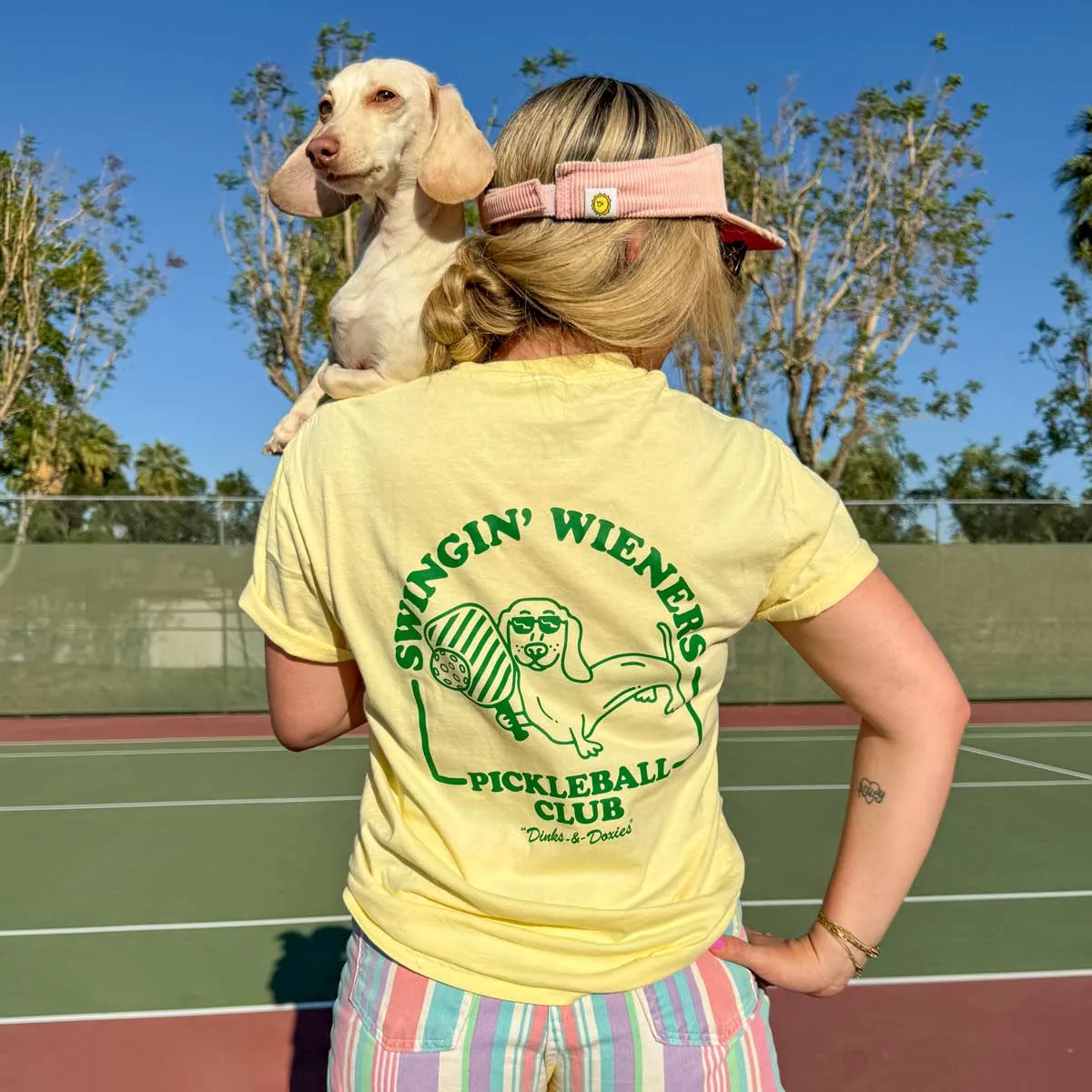 swingin’ wieners pickle ball unisex pocket tee | banana